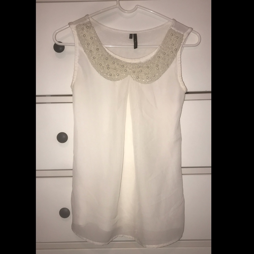 White shirt with pearls
